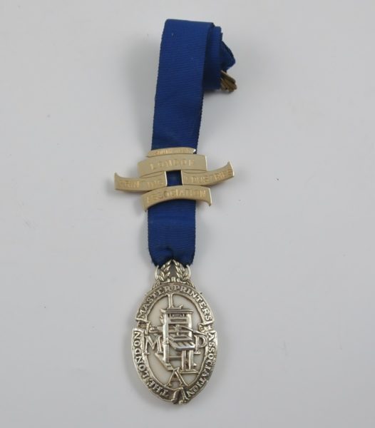 Arts and Crafts cast silver and ivory medallion, London 1930 by Omar Ramsden.
