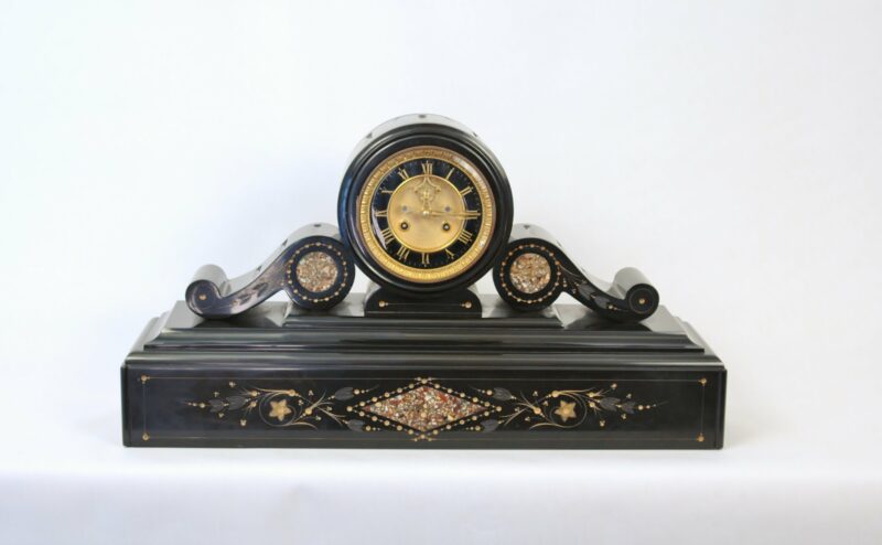 Early 20th century French slate cased clock with visible jeweled escapement, Outside countwheel and Brocot suspension.