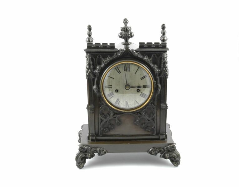 An English William IV bronze bracket clock in Gothic case by Knight & Withers Bristol.