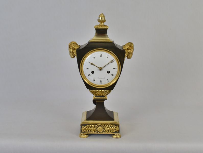 An early 19th century French gilt bronze and ormolu ‘Urn’ mantle clock by ‘Bienayme Fils’.