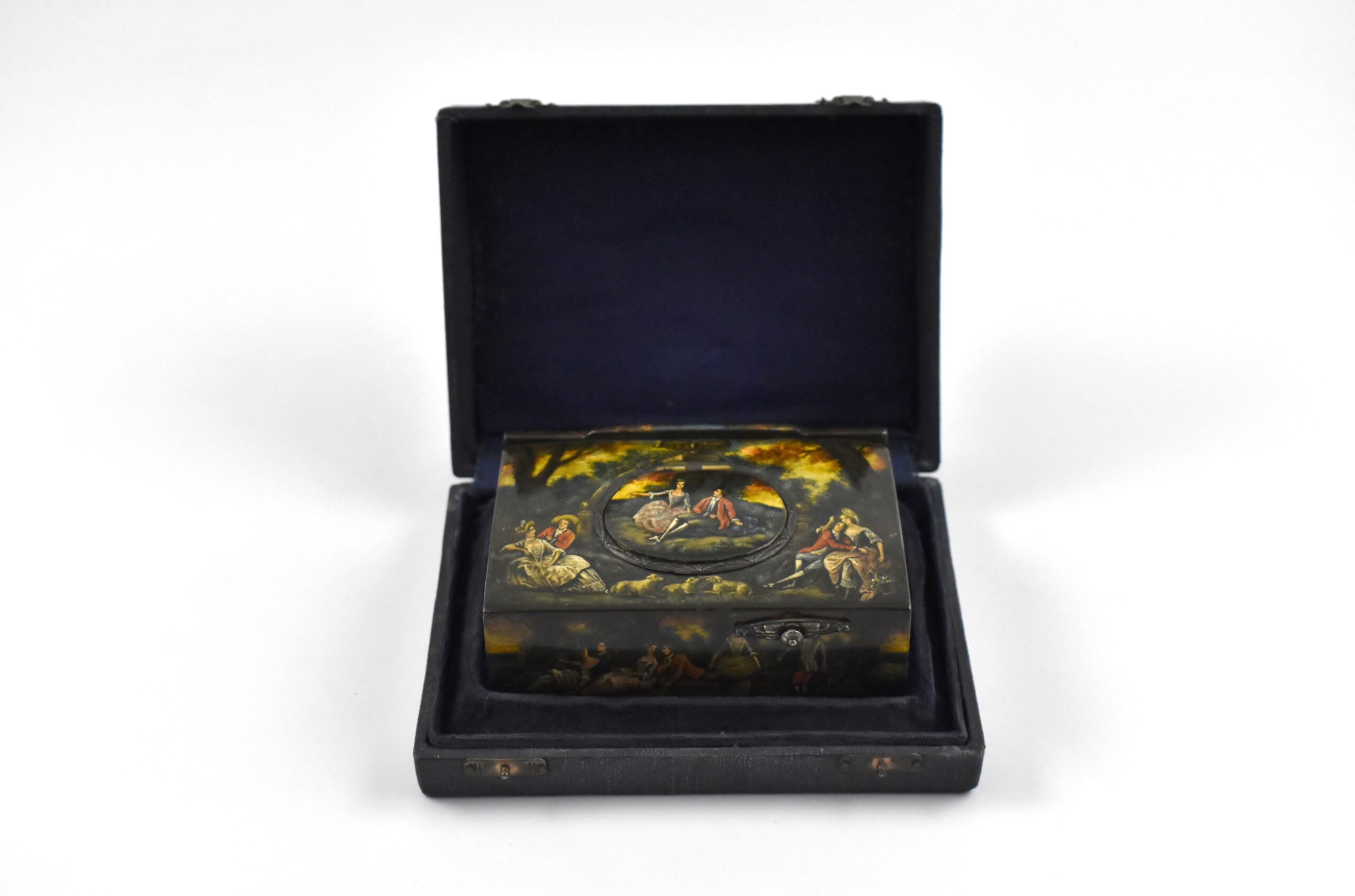 A late 19th century singing bird box decorated with hand painted romantic scenes contained in its original fitted case having a separate compartment for the bird shaped key.