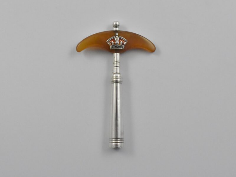 A late 18th century silver straight pull corkscrew with a blonde tortoiseshell handle.