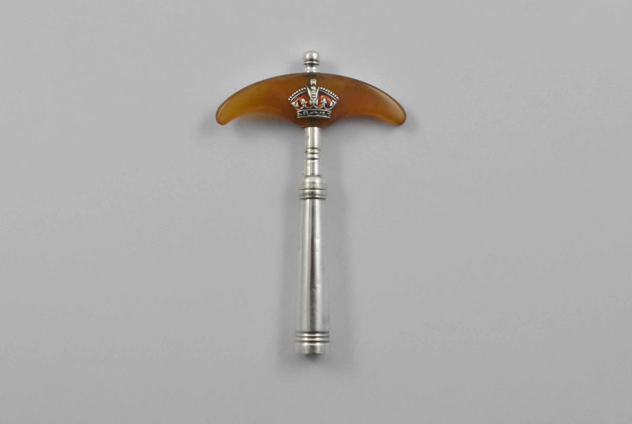 A late 18th century silver straight pull corkscrew with a blonde tortoiseshell handle.
