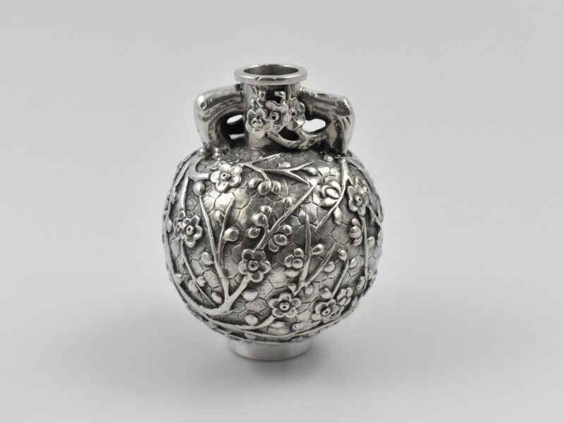 A late 19th century Chinese export silver vase with makers make to the base.