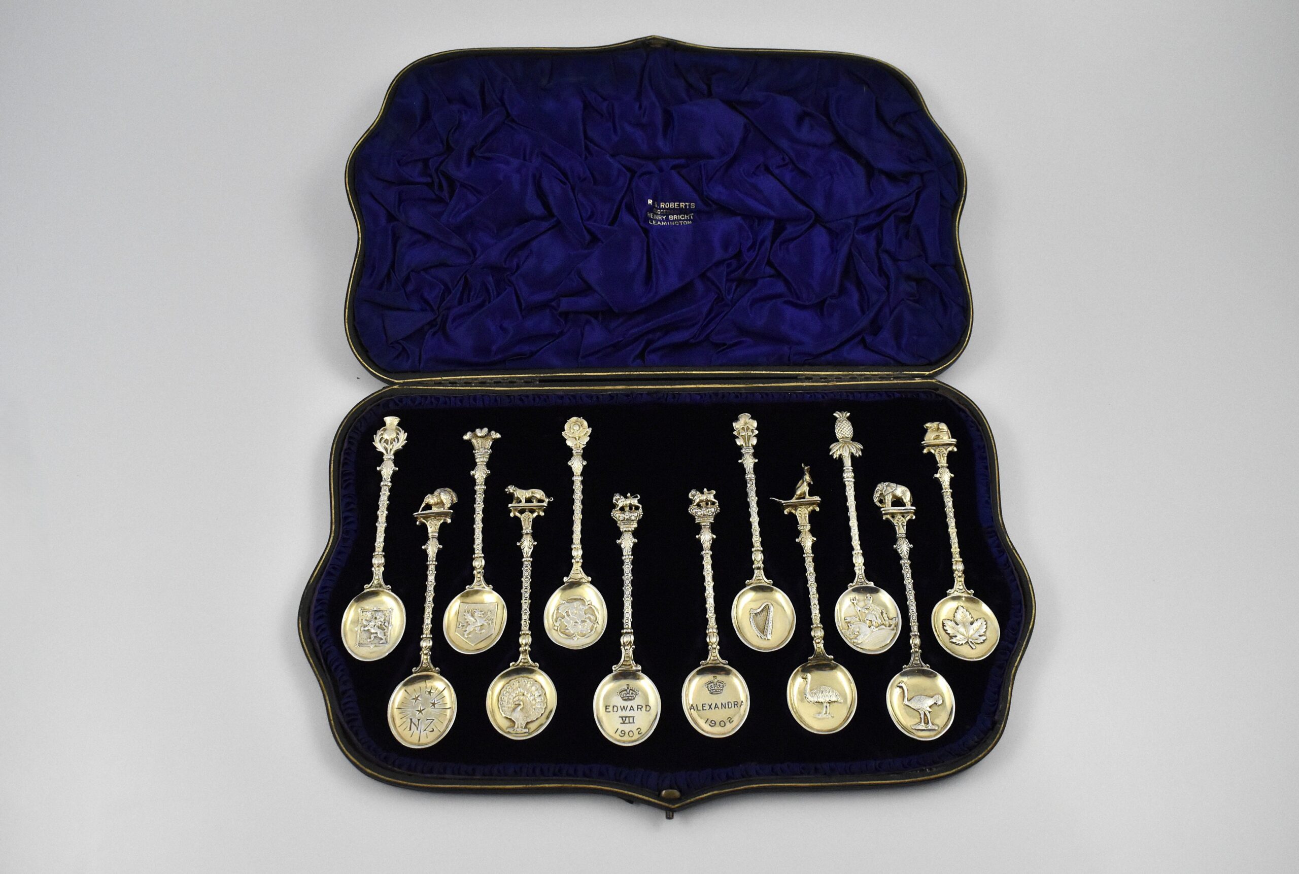 Cased set of twelve silver gilt commemorative spoons marked for London 1902, with Registered design number –Rd 386663 for the coronation of Edward VII and Alexandra by Edward Barnard & Sons Ltd.
