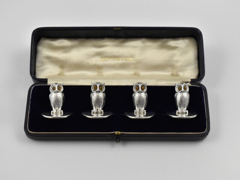 Cased set of four Edwardian novelty silver owl menu holders marked for Chester 1907 by Sampson Mordan & Co.