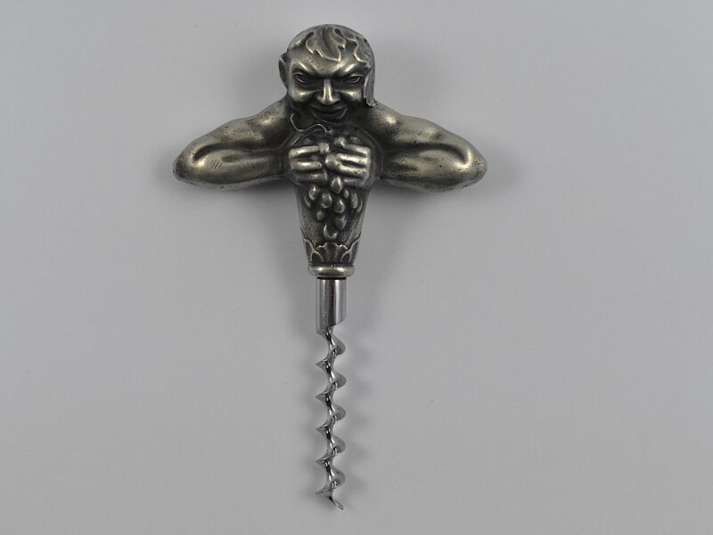 A Swedish straight pull corkscrew with a representation of Bacchus squeezing a bunch of grapes by the firm of Carl Victor Heljestrand (1816-1861).