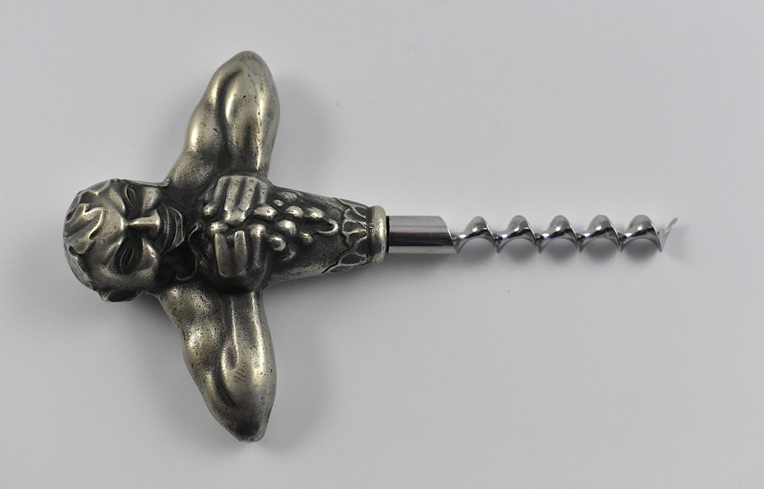A Swedish straight pull corkscrew with a representation of Bacchus squeezing a bunch of grapes by the firm of Carl Victor Heljestrand (1816-1861). - Image 2