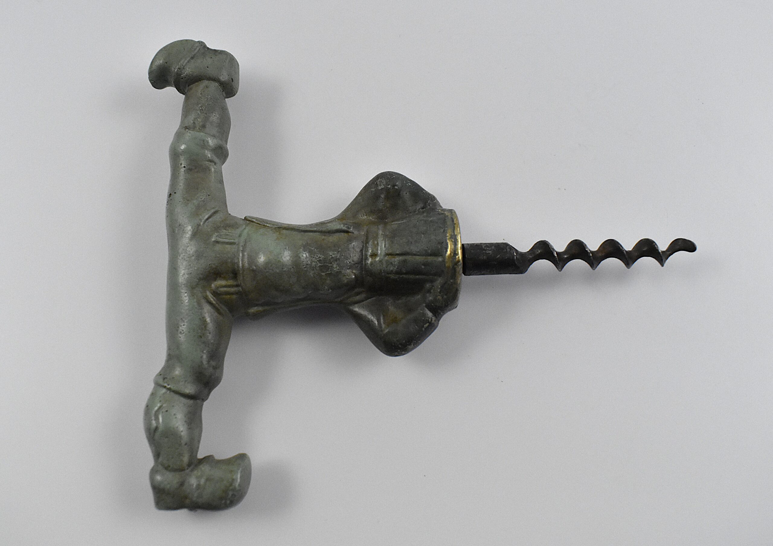 A Swedish cast bronze straight pull corkscrew with a representation of a Dutch man wearing clogs with his head stuck in a barrel. - Image 3