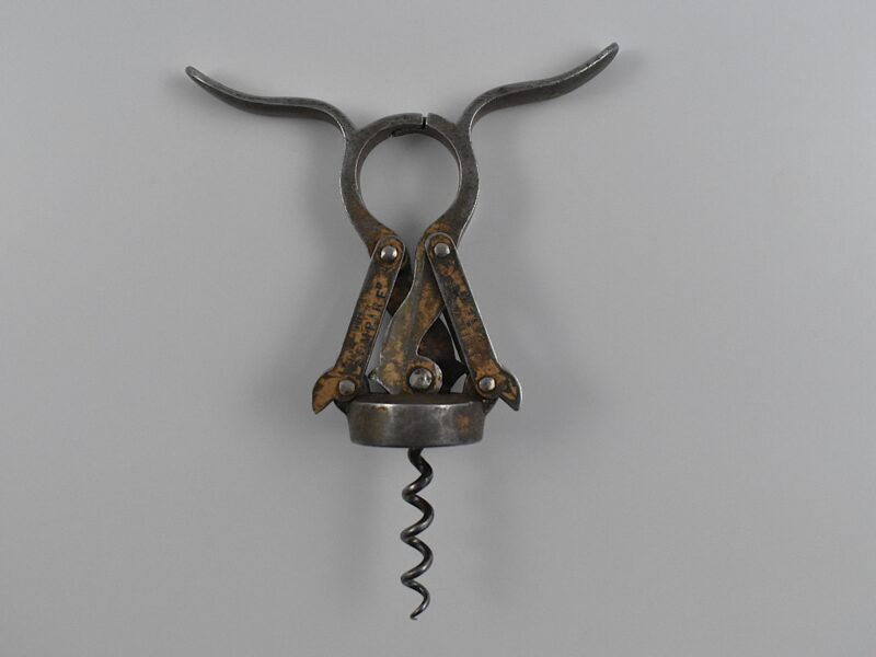 A rare English all steel, gold painted double lever corkscrew known as ‘The Empire’. This example marked “THE EMPIRE” and “J. HEELEY & SONS PATENT” on both sides.