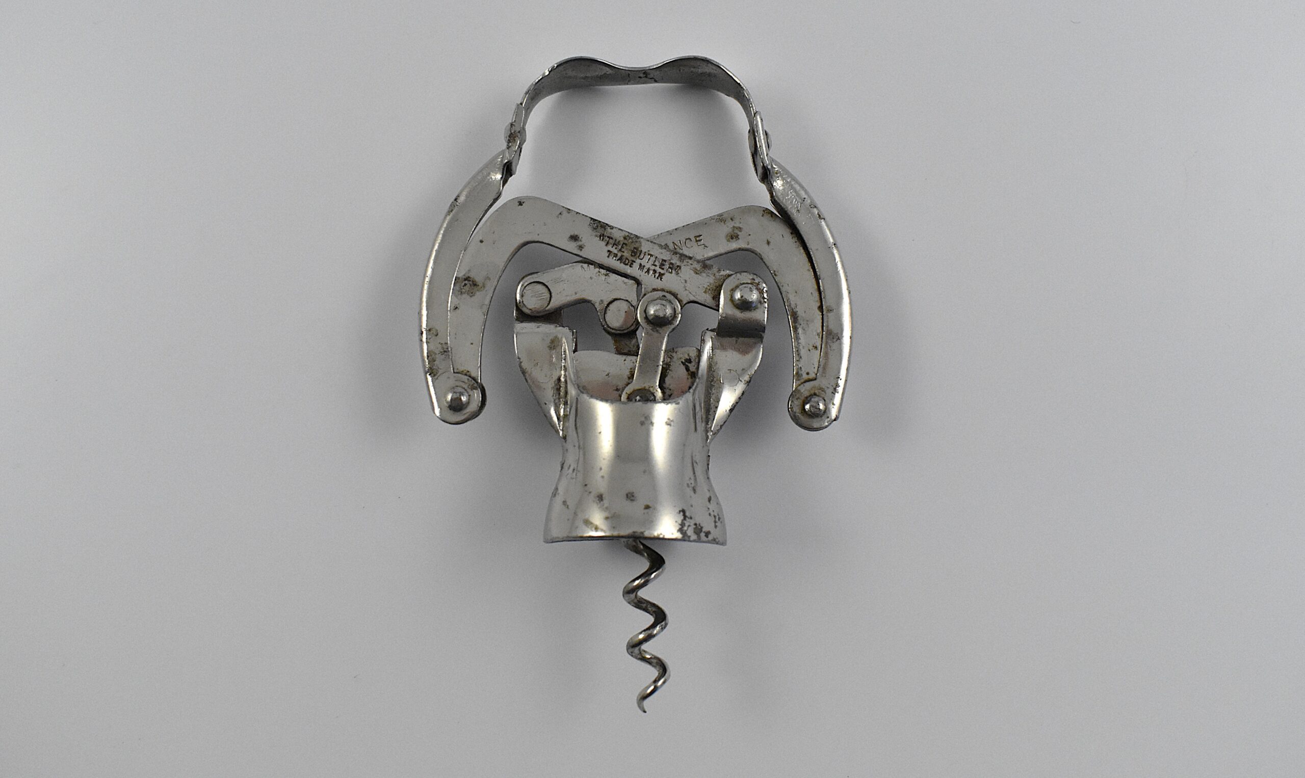 A French chrome plated corkscrew marked “THE BUTLER”, TRADE MARK, MADE IN FRANCE”