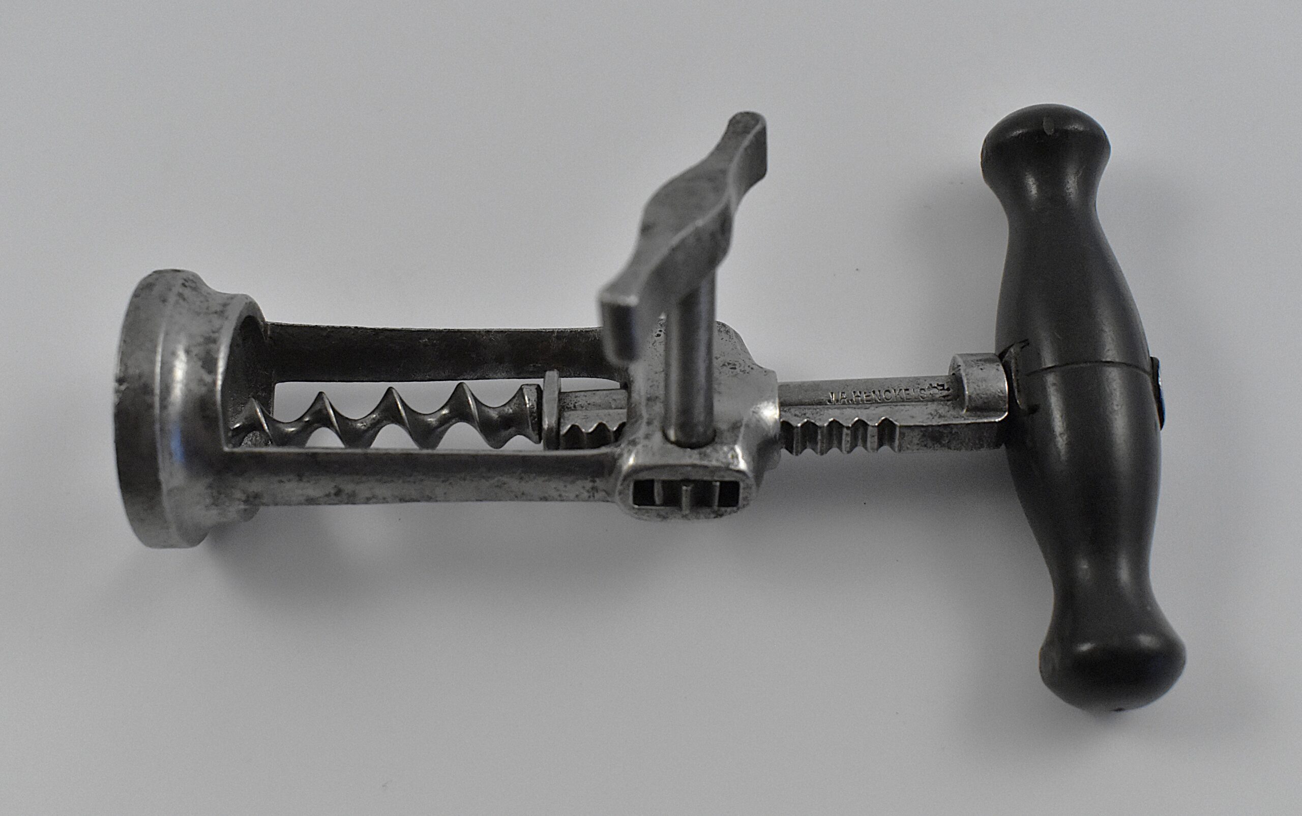 A German steel open frame corkscrew with side rack by J. A. HENCKELS as shown in the Henckels catalogue at the end of the 19th century. - Image 5