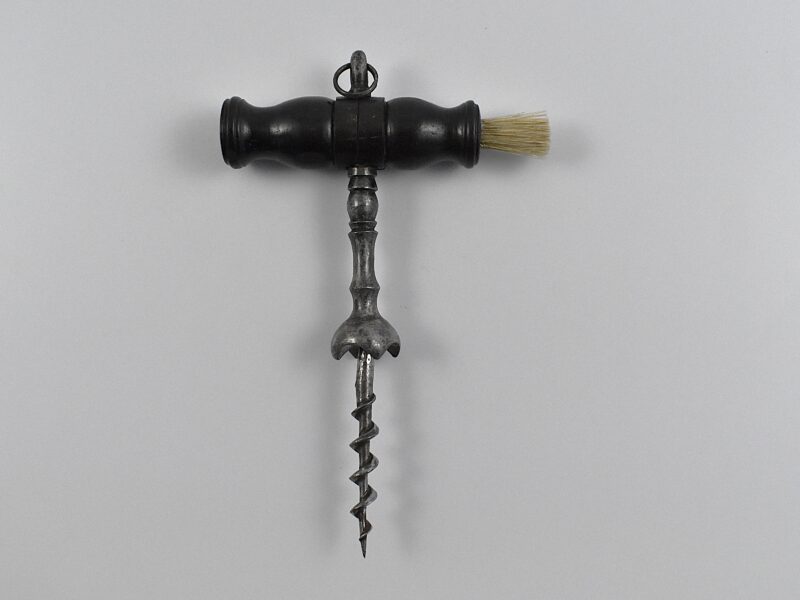 A French straight pull corkscrew with turned wooden handle incorporating a dusting brush and hanging ring.