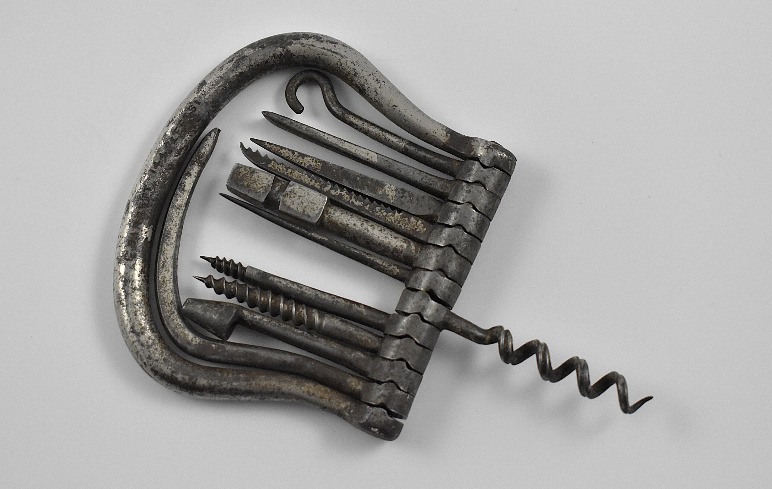 A magnificent English all-steel multi-tool folding bow containing eleven tools marked "C BARRETT 144 FLEET ST”. - Image 4