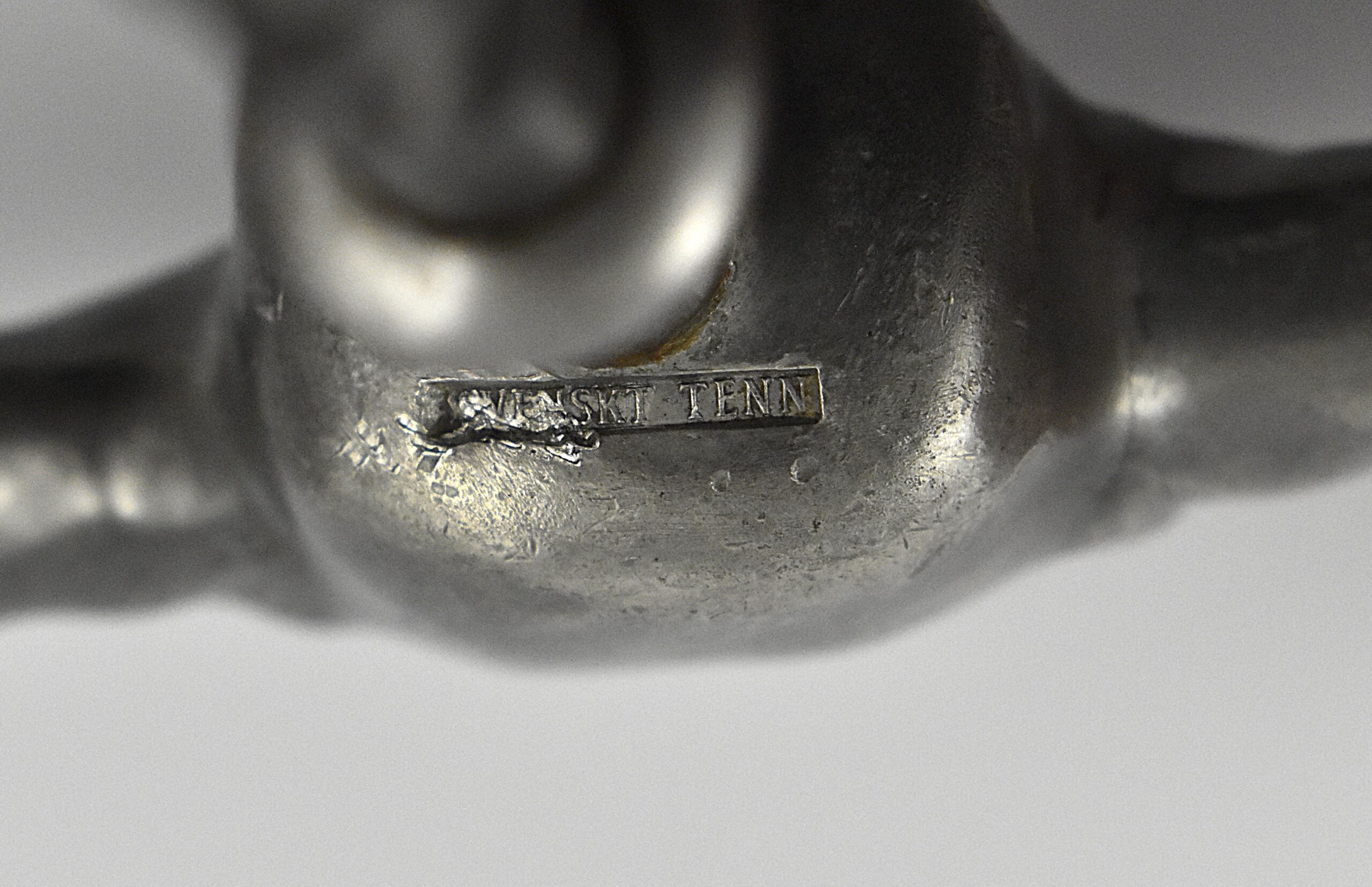 A Scandinavian straight pull cast pewter corkscrew with a representation of Ivan Bratt (1878- 1956) holding a bottle and glass in his outstretched arms. He was a Swedish politician who introduced the state – owned alcohol monopoly in 1917. He was detested for the introduction of the S. C. Bratt system which limited the purchase of no more than four litres of alcohol per month per person. This example marked “SWENSKIT TENN” (Swedish Pewter) under the back. - Image 4