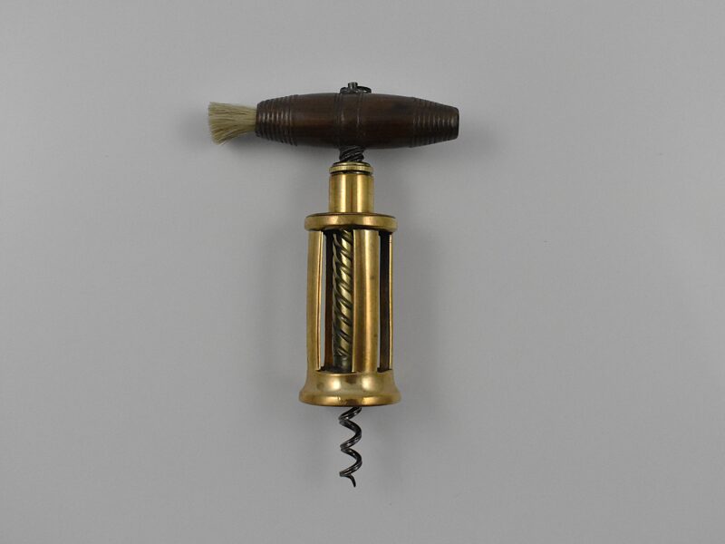 A magnificent brass Thomason IX four pillar corkscrew with a turned wood handle incorporating a hanging ring and dusting brush. Marked on the top of the frame “EDWARD THOMASONS COMPOUND PATENT NE PLUS ULTRA” with a coat of arms and on the button “THOMASONS PATENT NE PLUS ULTRA”. Edward Thomason’s patent was taken out the 7th of May 1802 and the “Ne Plus Ultra” is translated as “None Better”