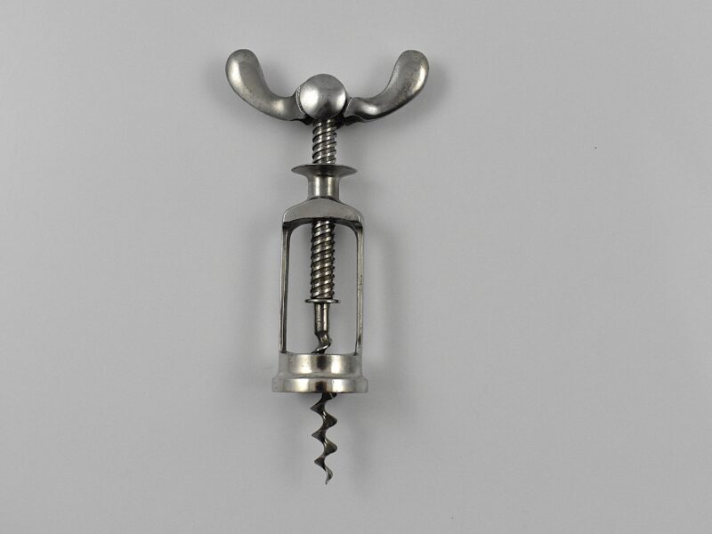 A chrome plated all steel mechanical corkscrew known as the ‘Bodega’. This was after Ernst Scharff’s 1899 German patent. This example marked “MADE ITALY” on the frame.