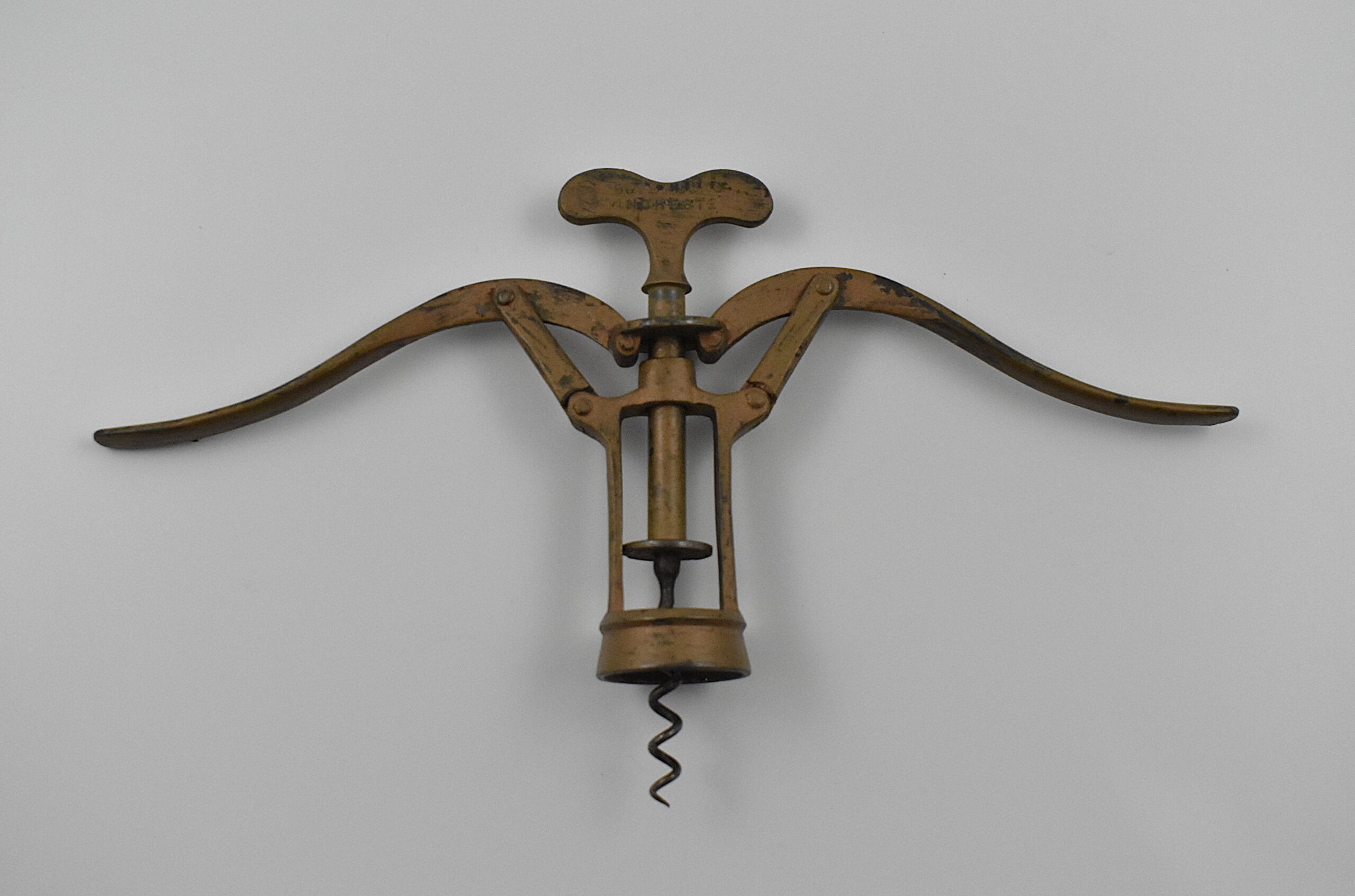 An all-steel James Heeley & Sons double lever corkscrew with the original copper bronze wash. This example marked “JAMES HEELEY & SONS 6006 PATENT DOUBLE LEVER” on the handle and ‘A 1 PATENT’ on the arms. Neville Smith Heeley trading as James Heeley and Sons of Graham Street, Birmingham was granted a patent No. 6,006 on the 23rd of April 1888 for this design. - Image 2