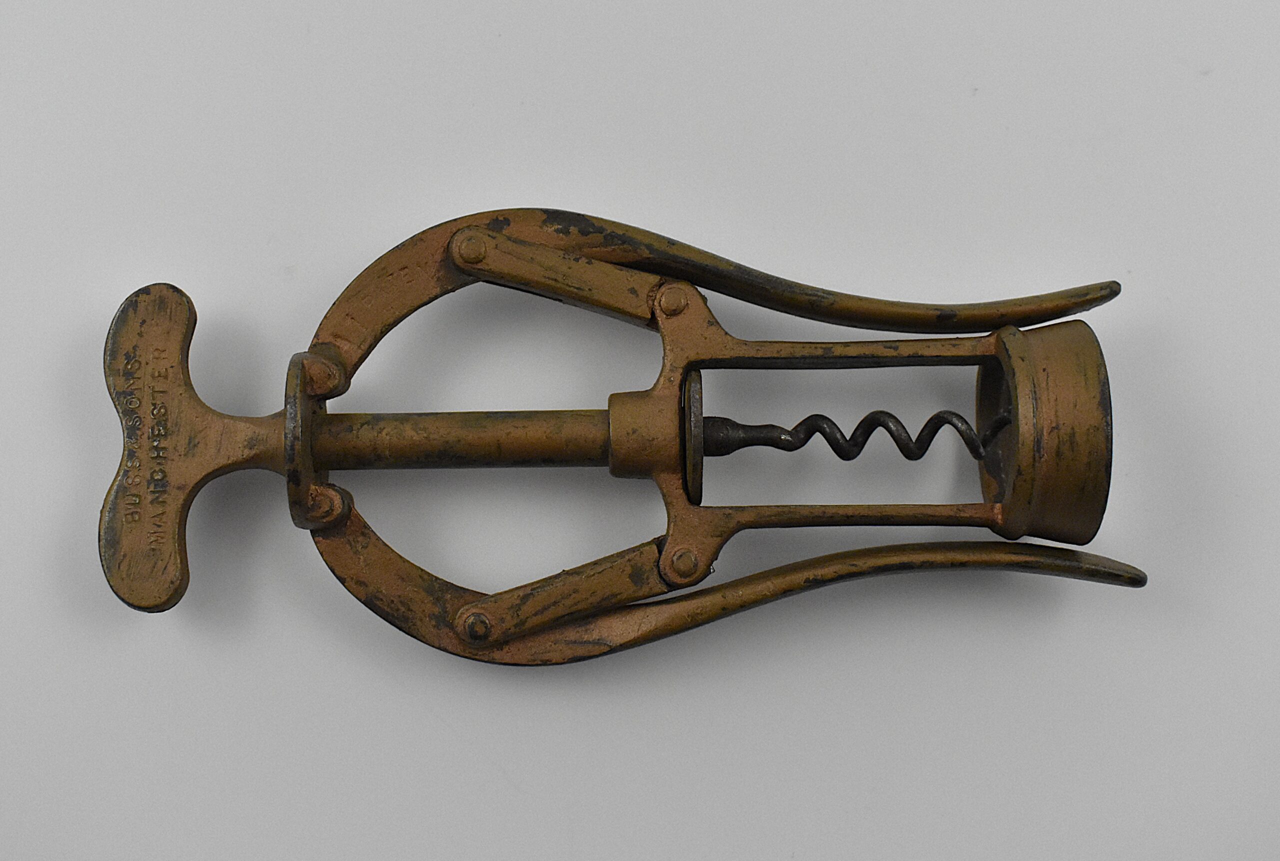 An all-steel James Heeley & Sons double lever corkscrew with the original copper bronze wash. This example marked “JAMES HEELEY & SONS 6006 PATENT DOUBLE LEVER” on the handle and ‘A 1 PATENT’ on the arms. Neville Smith Heeley trading as James Heeley and Sons of Graham Street, Birmingham was granted a patent No. 6,006 on the 23rd of April 1888 for this design. - Image 4