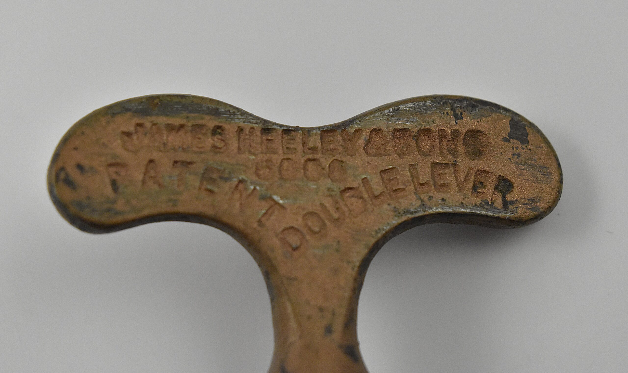 An all-steel James Heeley & Sons double lever corkscrew with the original copper bronze wash. This example marked “JAMES HEELEY & SONS 6006 PATENT DOUBLE LEVER” on the handle and ‘A 1 PATENT’ on the arms. Neville Smith Heeley trading as James Heeley and Sons of Graham Street, Birmingham was granted a patent No. 6,006 on the 23rd of April 1888 for this design. - Image 5